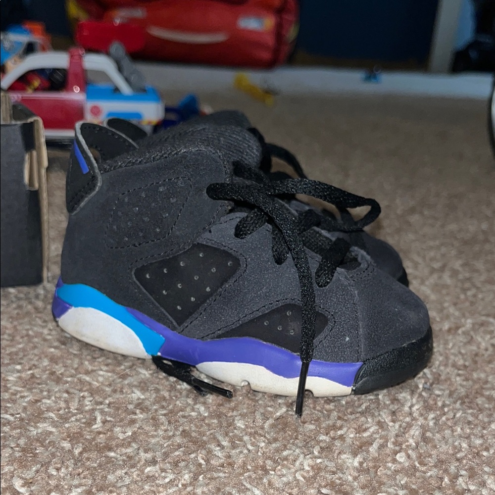 Toddler Jordan 6 Retro "Aqua" sneakers.